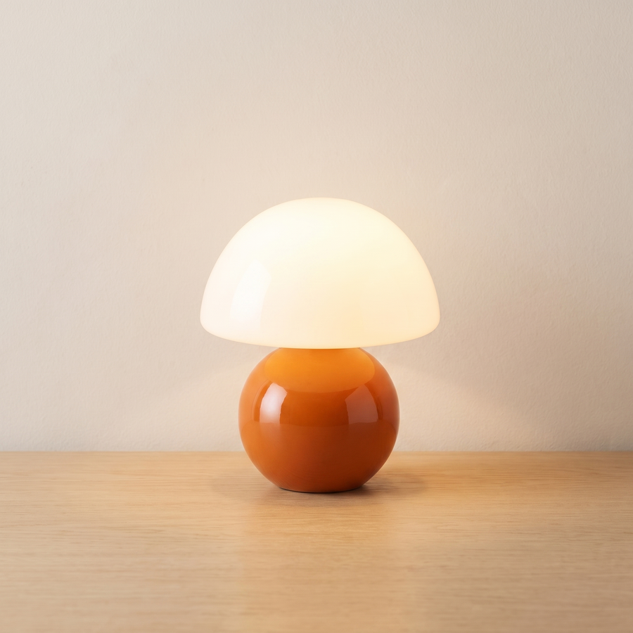 Pebble table lamp lit on light oak