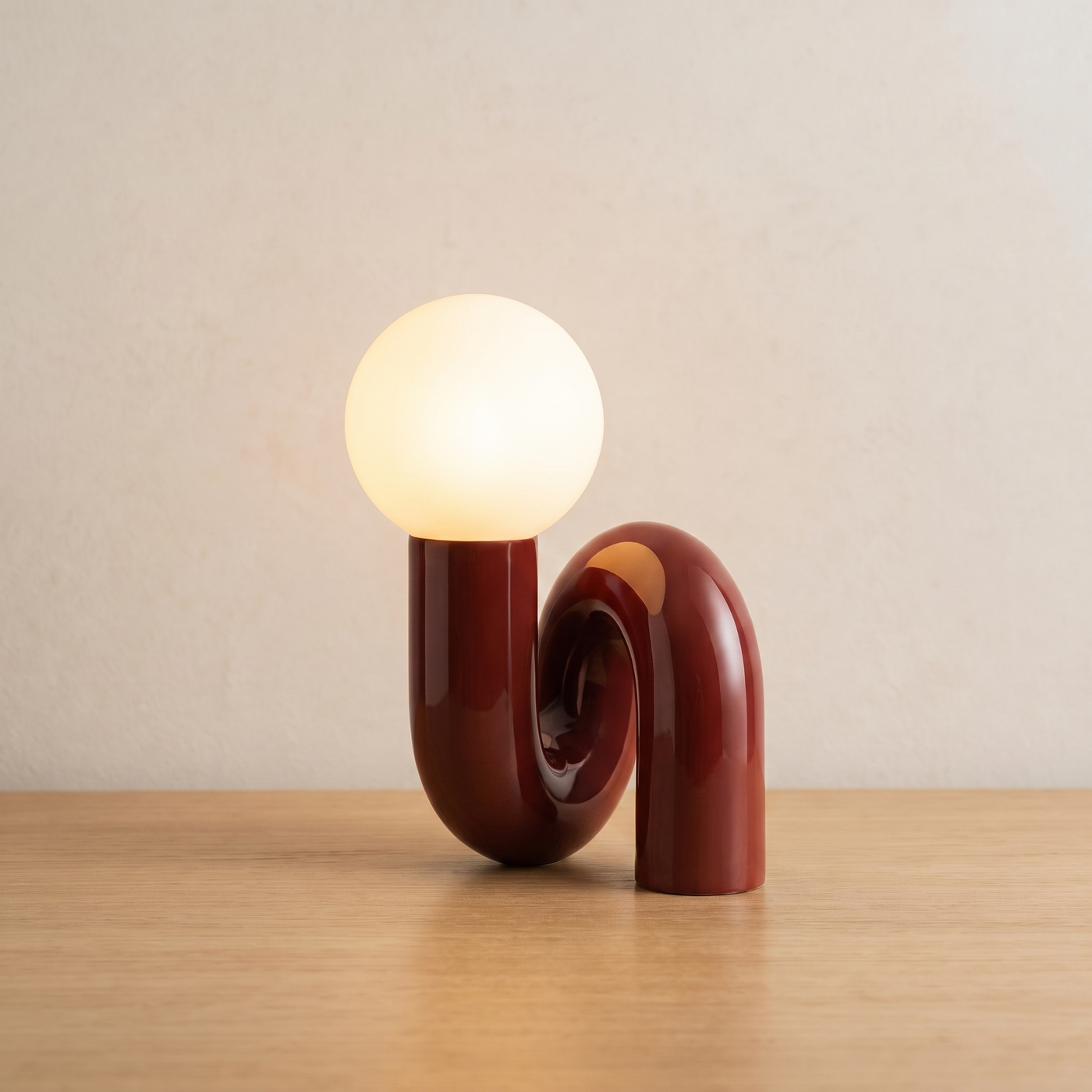 Ripple table lamp lit on light oak