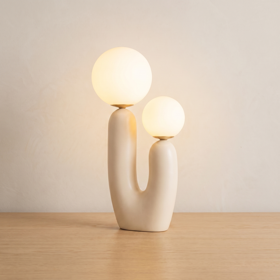 Sprig table lamp lit on light oak