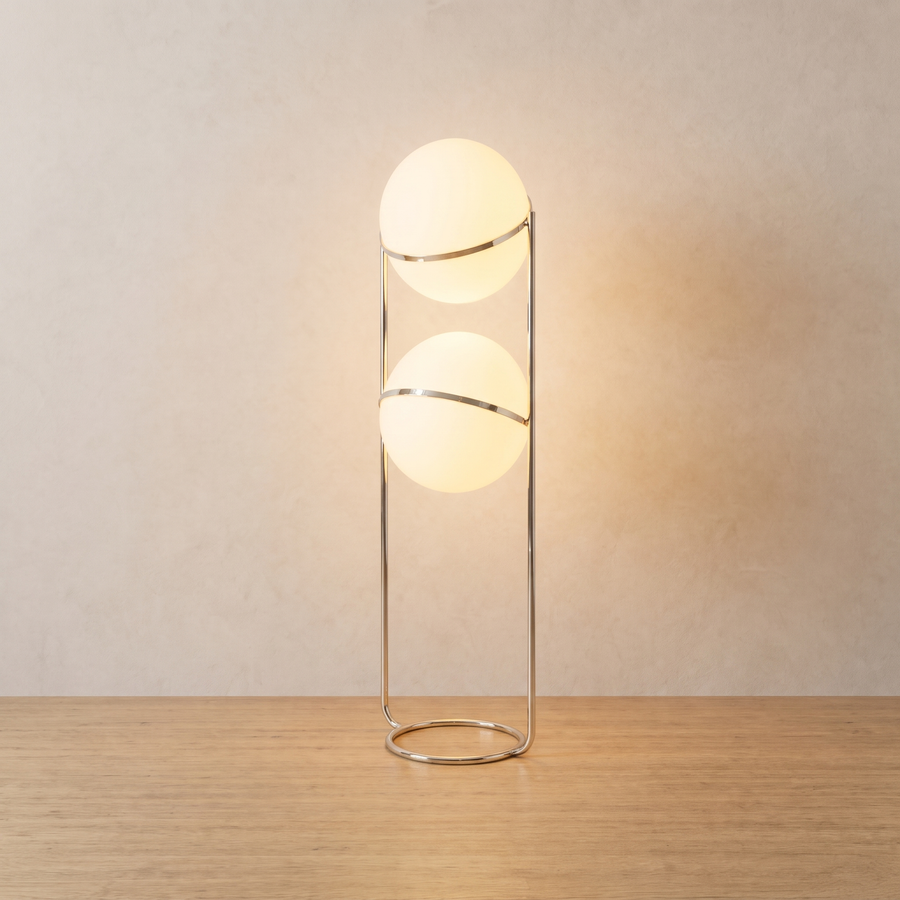 Tandem floor lamp lit on light oak